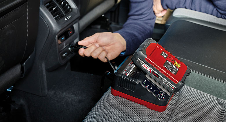 Power X-Change Car Charger connected to car with battery plugged in